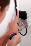 Electrician Installing Wall Outlets