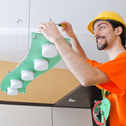 Electrician Working On Cabling Lighting