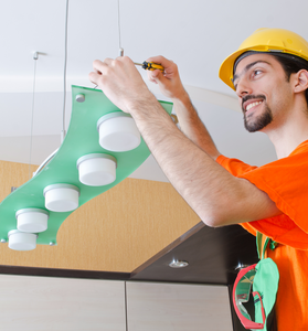 Electrician Working On Cabling Lighting