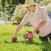 Lawnmower Equates Shrub In The Garden