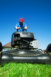 Man Mowing The Lawn