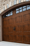 R-Value Intellicore Insulated Ultra-Grain Walnut Garage Door with Arch Window